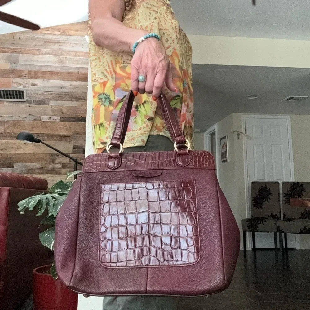Issac Mizrahi leather handbag with large faux croc pocket.   Magnetic closure